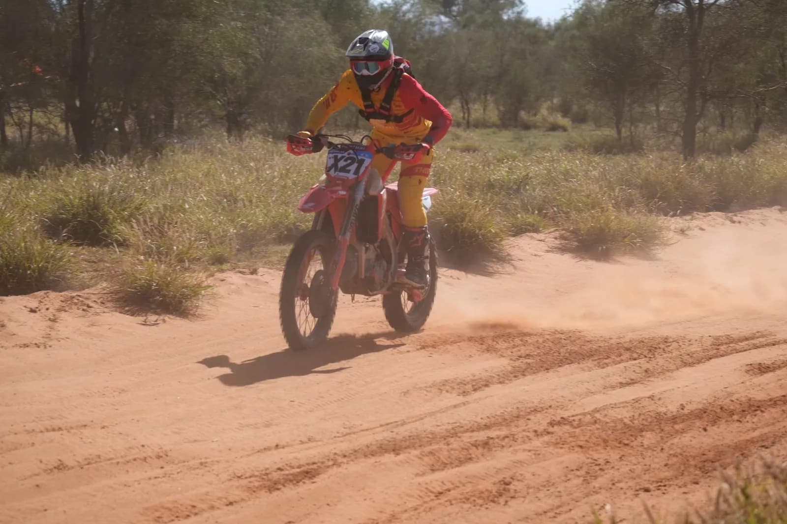 Andrew Michalak on bike X21 powering through a sandy section of the Finke Desert Race course.